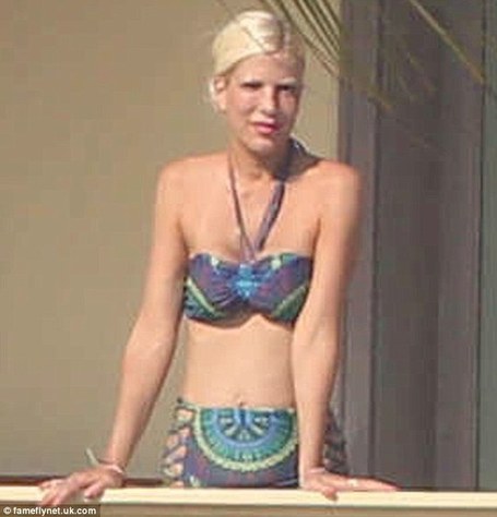 Mother-of-four Tori Spelling looks trim and toned in cute paisley bikini | Cabo San Lucas | Scoop.it