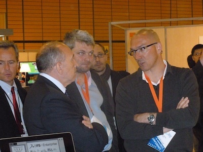 WWW2012 : G&eacute;rard Collomb, maire de Lyon, sur le stand Antidot | Antidot - Moteurs de recherche et solutions d'acc&egrave;s &agrave; l'information | Scoop.it
