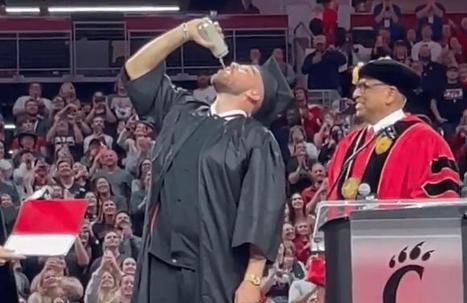 SPORTS: Chiefs' Travis Kelce chugs beer moments...