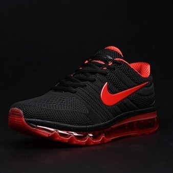 black nike shoes with pink tick