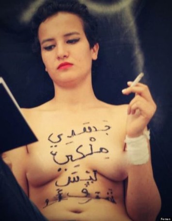 Tunisian Feminist Sent to Looney Bin for Posting Topless Photos | Herstory | Scoop.it