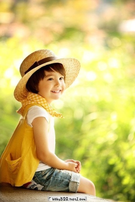 cute baby in yellow dress