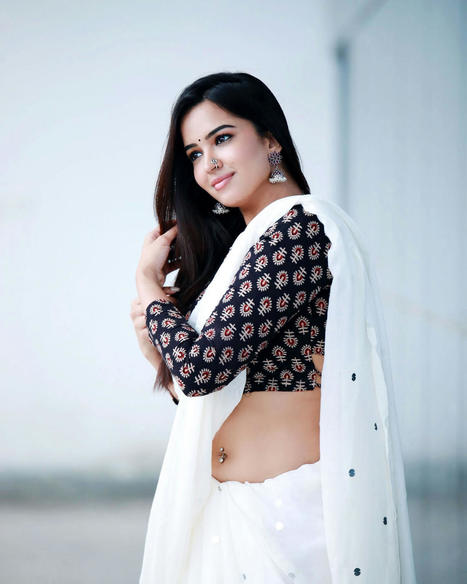 Pujita Ponnada in white saree photos | South Indian Actress | Scoop.it