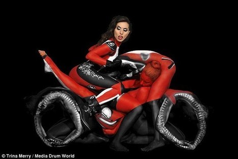 Nude models in body paint pose as a Ducati motorcycle and rider | Ductalk: What's Up In The World Of Ducati | Scoop.it